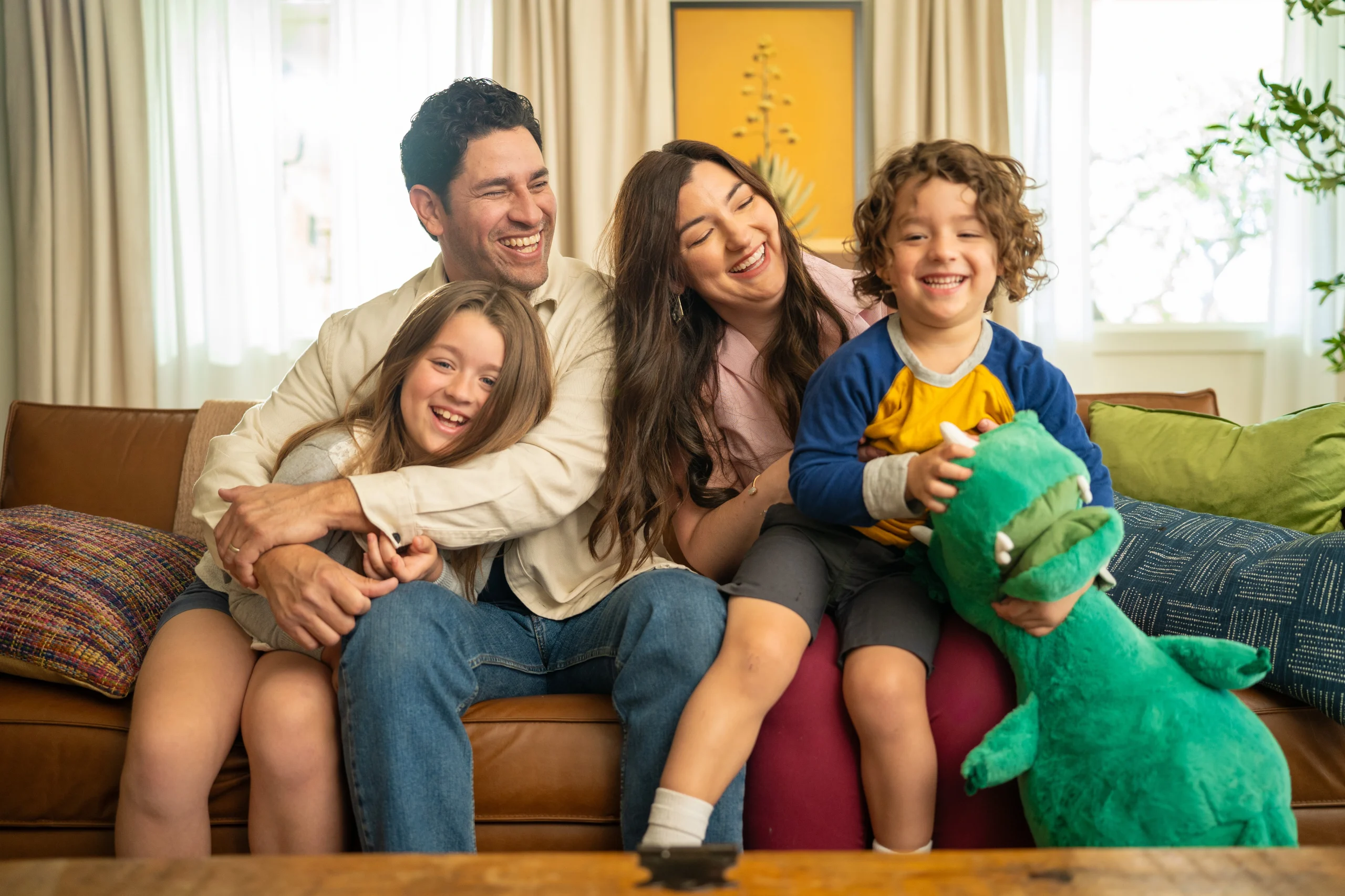 View of family that is happily satisfied with the indoor air quality of their home.