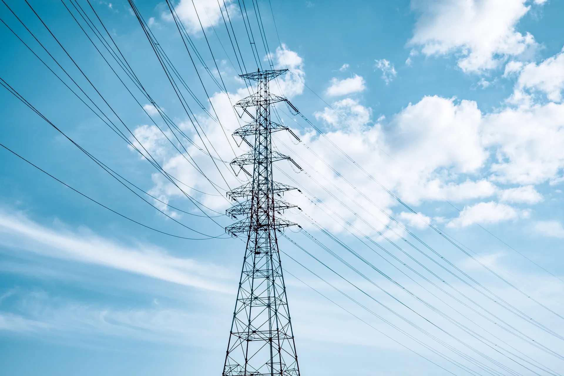 A close-up view of an electrical pole, highlighting its components and wires.